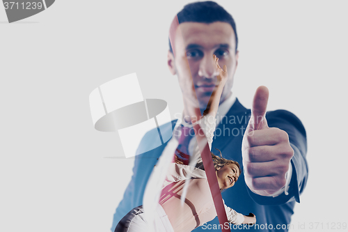 Image of double exposure of Businessmen making his thumb up saying OK