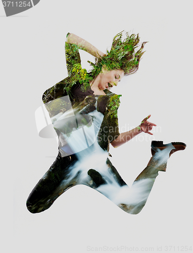 Image of double exposure of nature and  young woman dancing