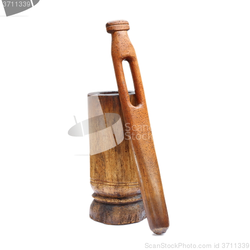 Image of old weathered wooden grinder