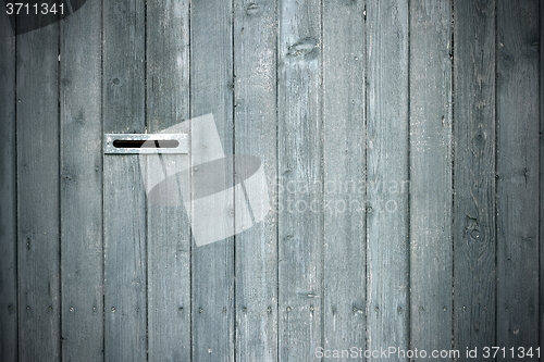 Image of mailbox on fence