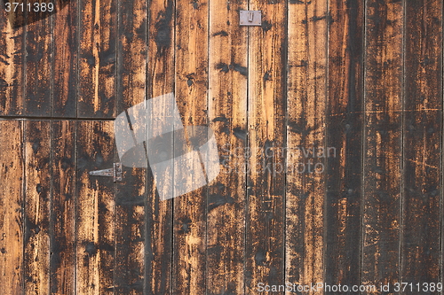 Image of weathered fir planks on old house