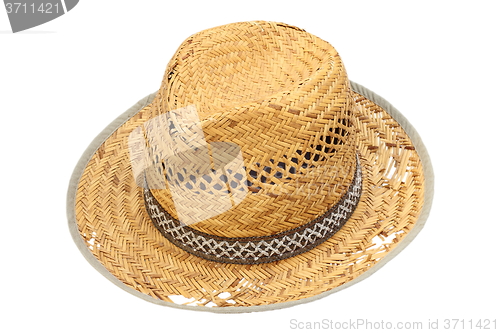 Image of old damaged wicker hat over white