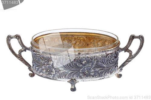 Image of ancient metallic pot over white