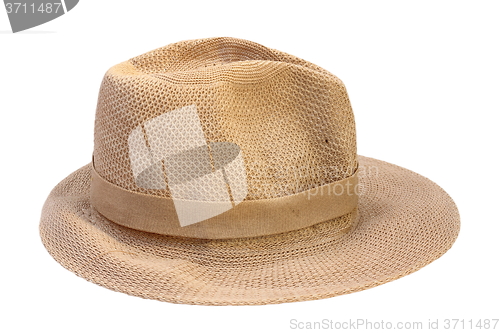 Image of beige straw hat over white