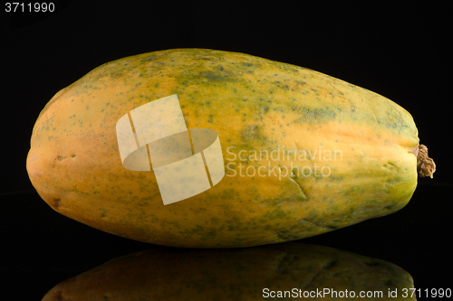 Image of Papaya fruit on black background