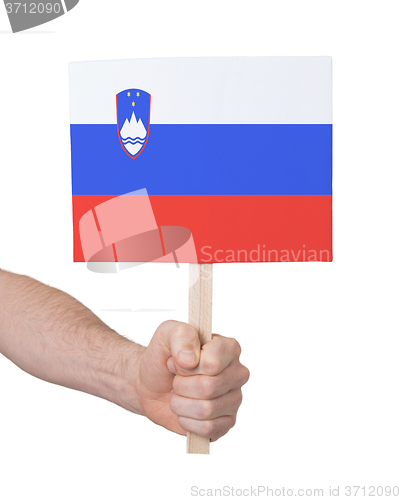 Image of Hand holding small card - Flag of Slovenia