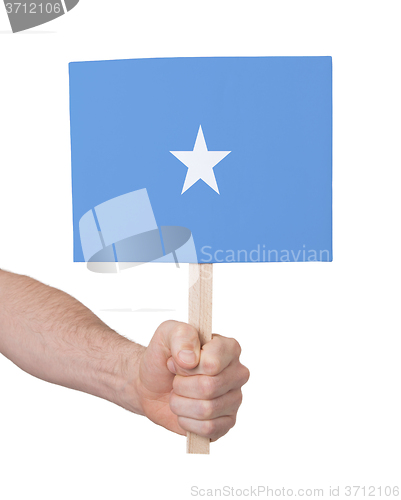 Image of Hand holding small card - Flag of Somalia