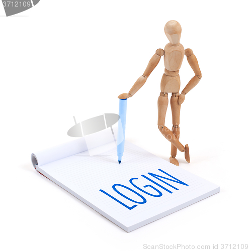 Image of Wooden mannequin writing - Login