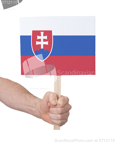 Image of Hand holding small card - Flag of Slovakia