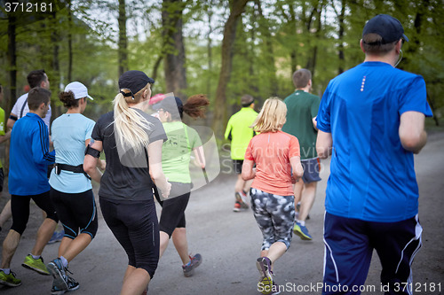 Image of Young runners in the park