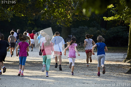 Image of Children running in park