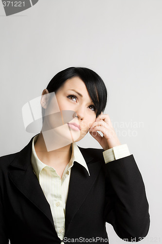 Image of Thinking businesswoman