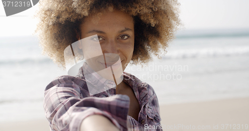 Image of Happy Woman Giving Hand On Beach