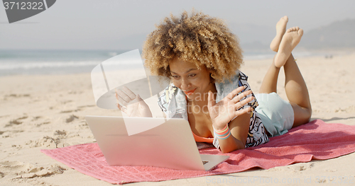 Image of Woman Using Her Laptop Outdoor