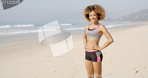 Image of Sport Woman Standing On The Beach