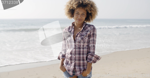 Image of Casual Young Woman Standing At The Beach