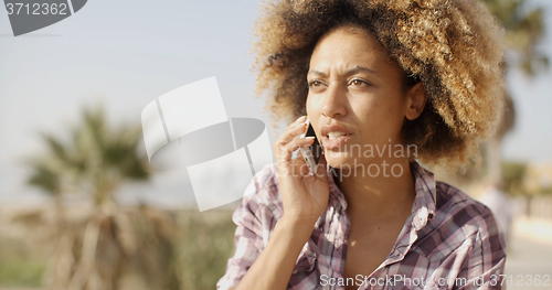 Image of Woman Talking With Mobile Phone