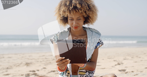 Image of African American Girl Using Tablet Pc At Beach