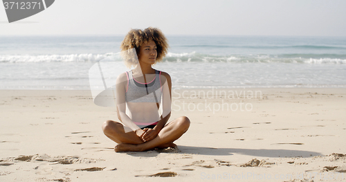Image of Girl Relaxing On A Beach