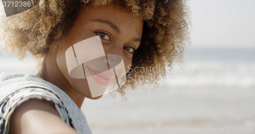 Image of Young Girl Beckoning To Come