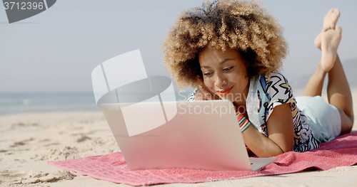 Image of Young Girl Using Computer