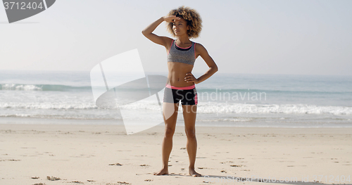 Image of African-American Girl Enjoys A Beach Lifestyle.
