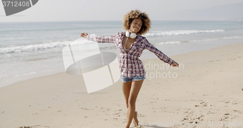 Image of Woman Relaxing On The Beach