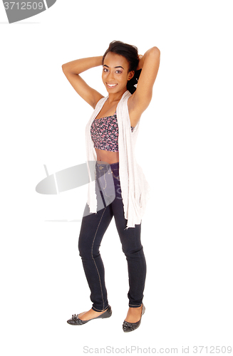 Image of African American woman standing in jeans.
