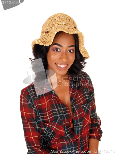 Image of African American woman with straw hat.