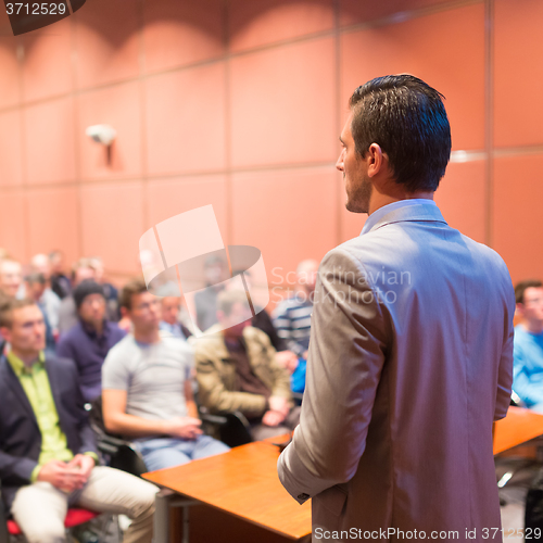 Image of Speaker at Business Conference and Presentation.