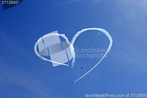 Image of Vintage Aircraft Sky Writing Romantic Heart Shape