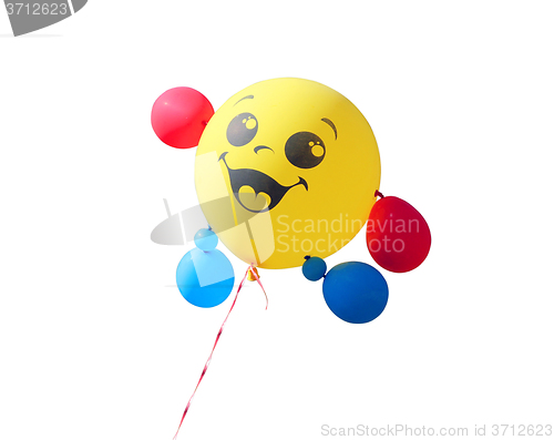 Image of Yellow balloon flying on a white background