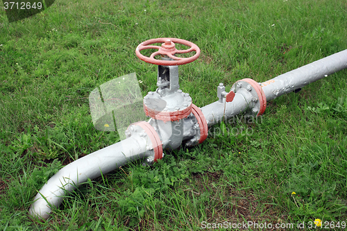 Image of gas pipe line and valve that laid through green field
