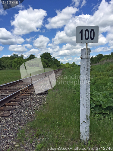 Image of Mile post  railway with the number one hundred