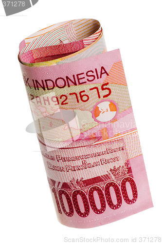 Image of Indonesian currency rolled

