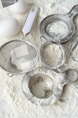 Image of Kitchen utensils and wheat flour