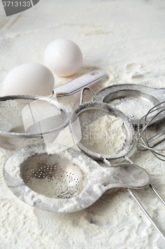 Image of Kitchen utensils and wheat flour