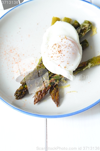 Image of Green asparagus with poached egg