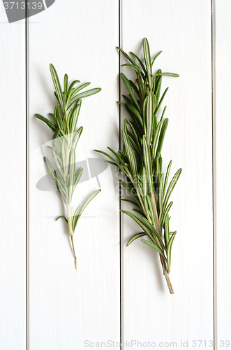 Image of Rosemary on wooden background