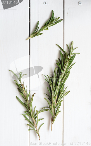 Image of Rosemary on wooden background