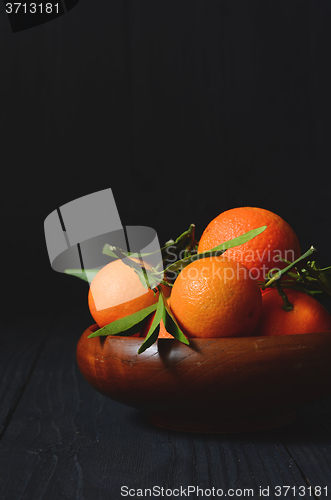 Image of fresh mandarins with leafs