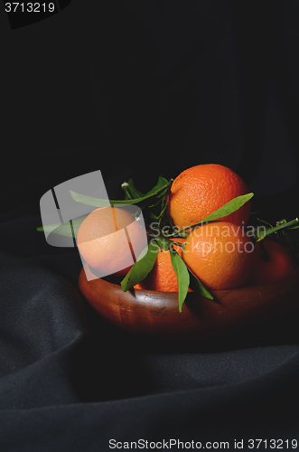 Image of fresh mandarins with leafs