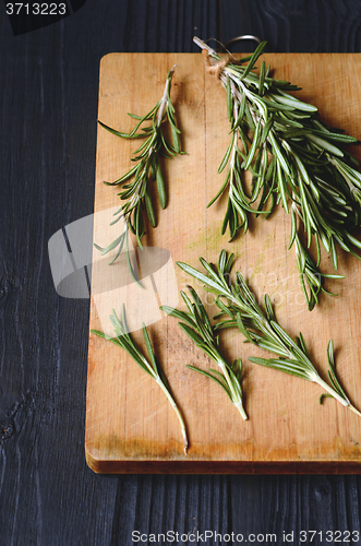 Image of Rosemary on wooden background