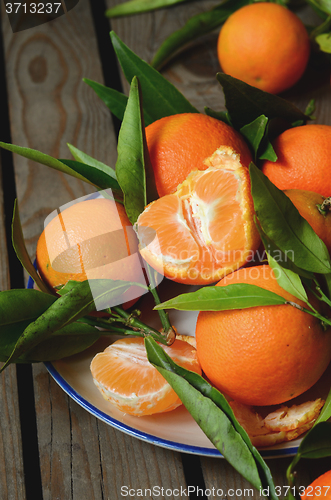 Image of fresh mandarins with leafs