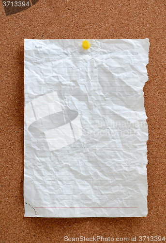 Image of Blank piece paper pinned into corkboard
