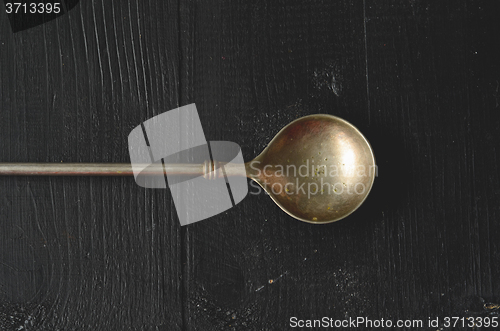 Image of Old metal spoon