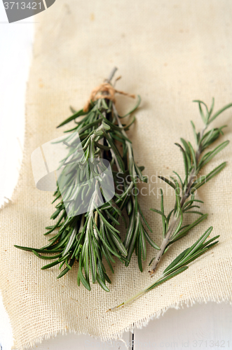 Image of Rosemary on wooden background