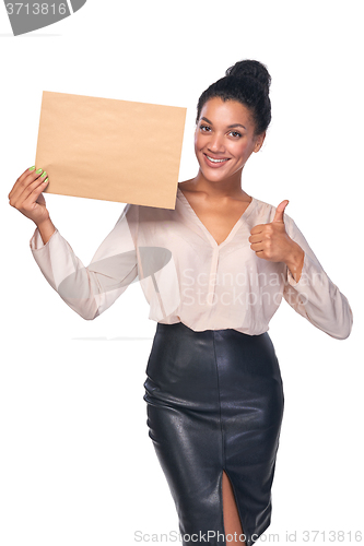 Image of Smiling businesswoman with parcel