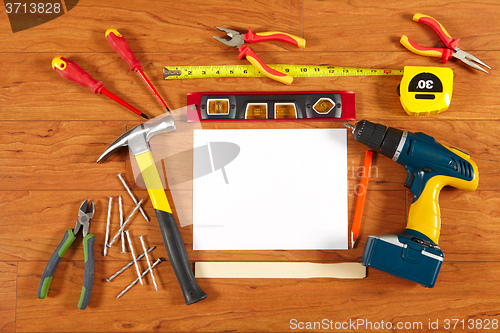 Image of Construction tools on the wooden floor