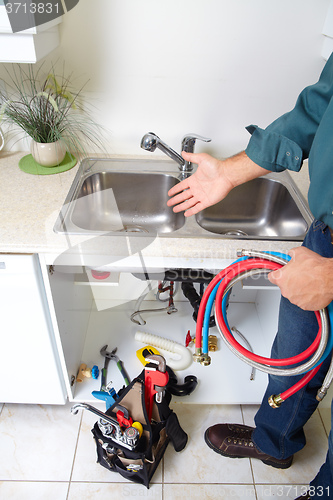 Image of Plumber on the kitchen.